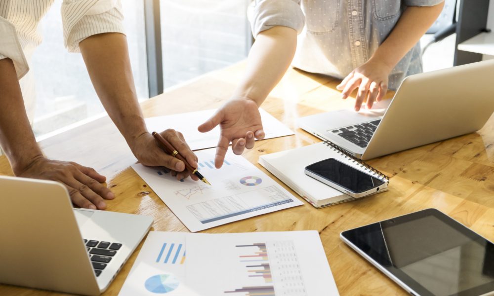 Business people meeting. Business people meeting to discuss the situation on the market.